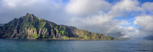 Rainbow at the entrance to the fjord of