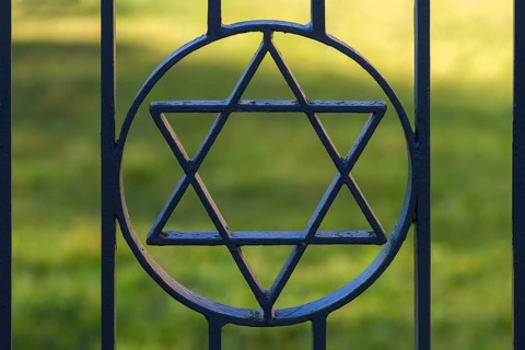 Star of David in the entrance gate of the historical Jewish cemetery