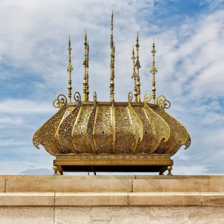 Ornate shiny metal lamp at the mausoleum of King Mohammed V