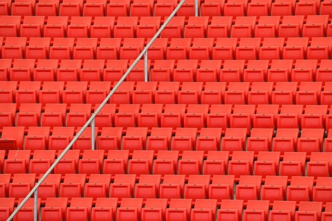 Red rows of seats on the grandstand