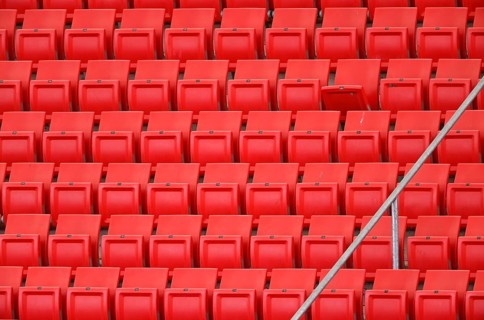 Red rows of seats on the grandstand