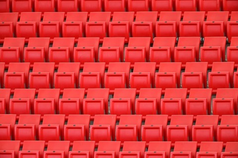 Red rows of seats on the grandstand