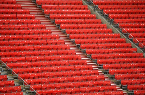 Red rows of seats on the grandstand