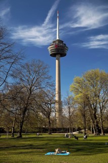 City garden in spring and telecommunications tower Colonius