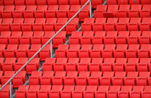 Red rows of seats on the grandstand