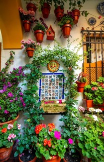 Fountain in the courtyard decorated with flowers