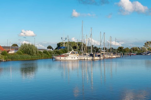 Sailing yachts on the river Harle