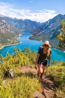Hiker walking at Plansee