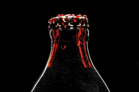 Bottle with crown cork with water drops