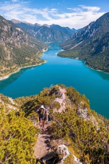 Hiker walking at Plansee