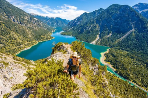 Hiker walking at Plansee