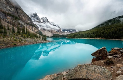 Clouds hanging between mountain peaks