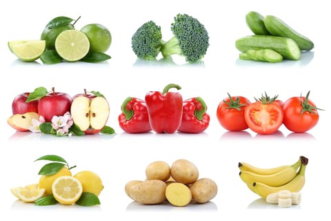 Fruits fruits and vegetables collection apple tomatoes lemon bananas colors fresh cropped isolated against a white background