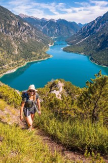 Hiker walking at Plansee