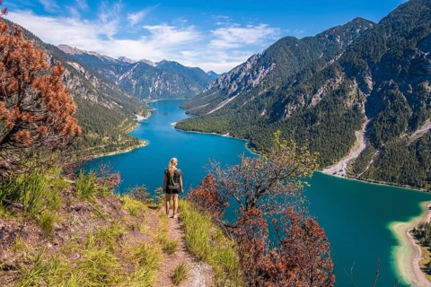 Hiker walking at Plansee
