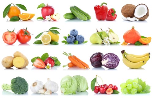 Fruit and Vegetable Fruits Apple Orange Lemon Berries Salad cropped on a white background