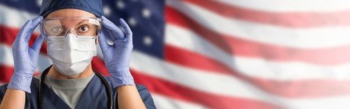 Doctor or Nurse Wearing Medical Personal Protective Equipment