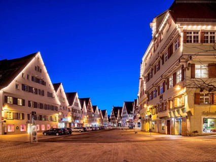 Illuminated houses at the market place
