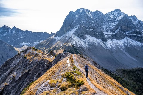 Hiker on degree in the mountains
