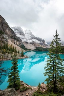 Clouds hanging between mountain peaks