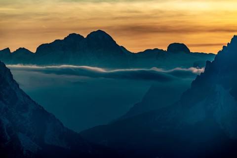 Mountain top of the Dolomites at sunset