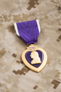 United states purple heart war medal on marine camouflage material