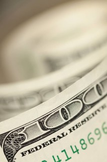 An abstract of one hundred dollar bills with narrow depth of field