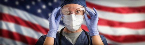 Doctor or Nurse Wearing Medical Personal Protective Equipment