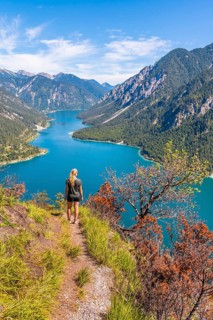 Hiker walking at Plansee
