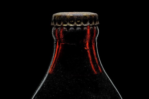 Old bottle with crown cork