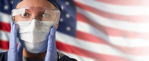 Doctor or Nurse Wearing Medical Personal Protective Equipment