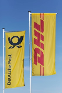 Flags with logos DHL and Deutsche Post