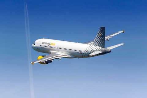 A Vueling Airbus A319 with the registration EC-MGF takes off from Barcelona Airport