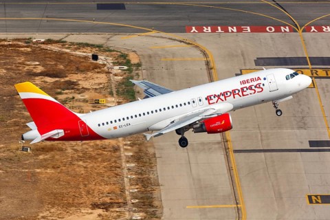 An Iberia Express Airbus A320 with the registration EC-LEA takes off from Palma de Majorca Airport