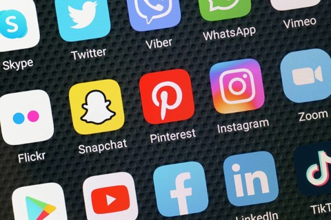 Social media app icons on a smartphone