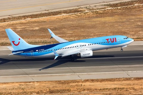 A TUI Boeing B737-800 with the registration G-FDZS takes off from Palma de Majorca Airport