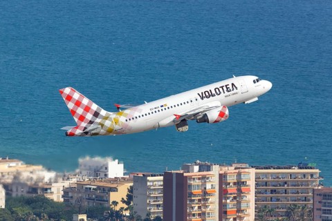 A Volotea Airbus A319 with the registration EC-MUX takes off from the airport in Palma de Majorca