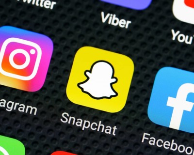 Snapchat app icon on a smartphone