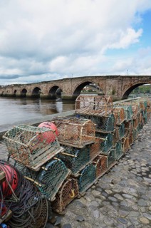 Crab fishing pots and sandstone one way bridge