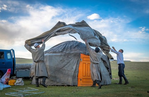 A ger can be built by 5 people in one hour