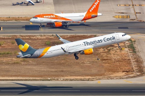A Thomas Cook Airbus A321 with the registration G-TCDK takes off from Palma de Majorca Airport