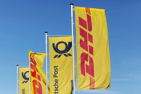 Flags with logos DHL and Deutsche Post