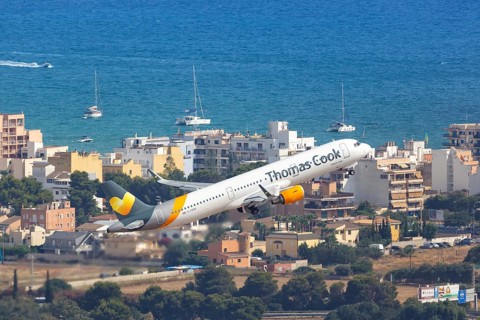 A Thomas Cook Airbus A321 with the registration G-TCDK takes off from Palma de Majorca Airport