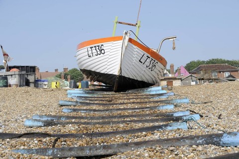 Fishing boat on shingle beach