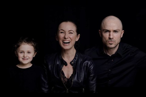 Family on black background