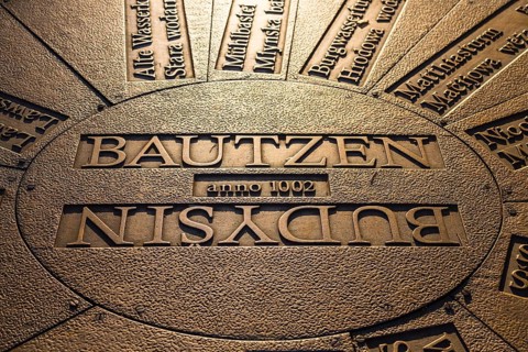 Relief plate in the floor with lettering Bautzen