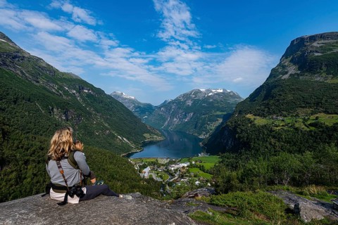 Mother with child overlooking Geirangerfjord