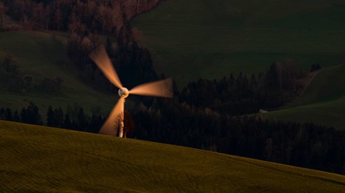 Windmill shines in the evening light