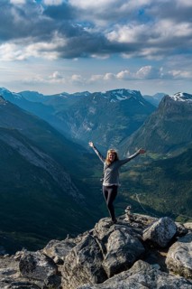 Woman standing on Dalsnibba View point