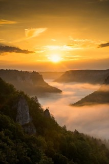 View from Eichfelsen to Werenwag Castle with morning fog